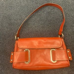 Wilsons leather read shoulder purse